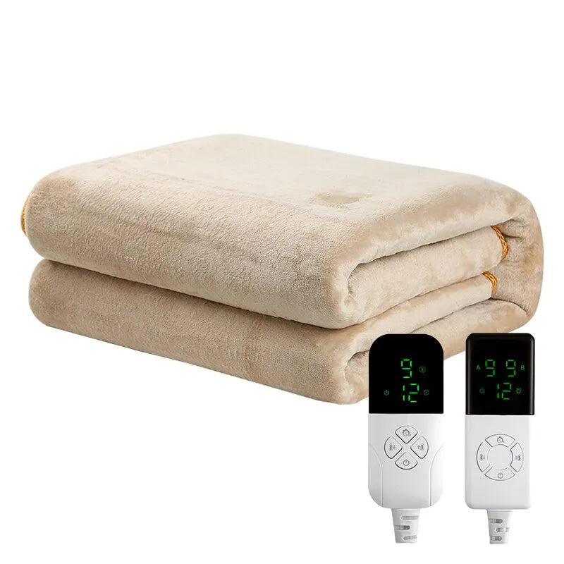 Folded beige electric blanket with two digital controllers on a white background